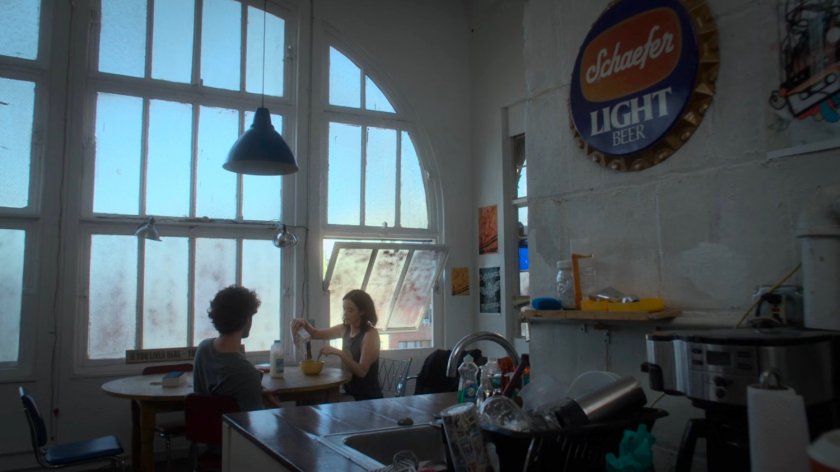 Jessica and Stirling inside of their loft.