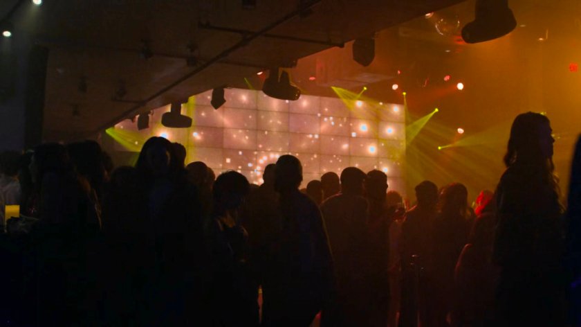 Crowds at a crowded dance club.