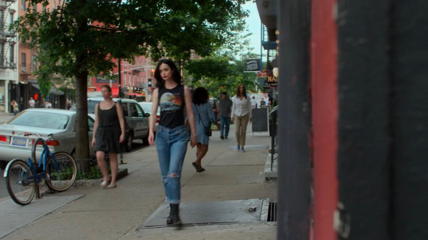 Jessica on a sidewalk, followed by Alisa.