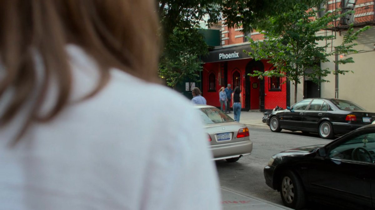 Alisa watching Jessica enter the Phoenix Bar.