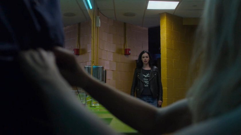 Jessica catches Trish in flagrante delicto in the dance club bathroom.