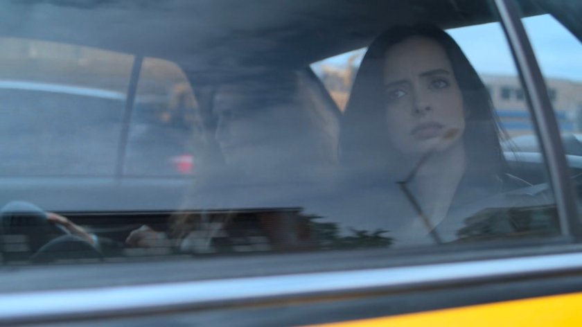 Jessica and Alisa in the back seat of a cab.