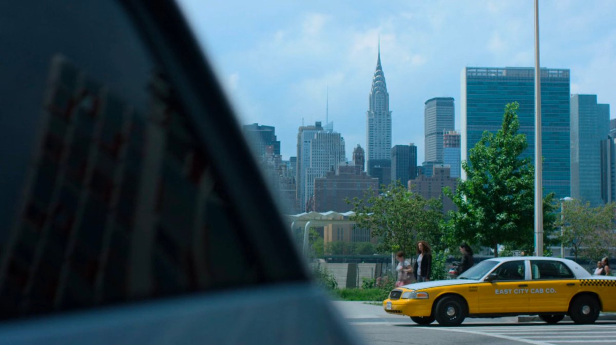 Jessica and Alisa exiting a cab by the park.