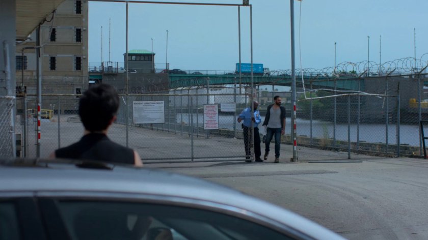 Shane exiting Northeastern Correctional Facility with Jeri waiting outside.