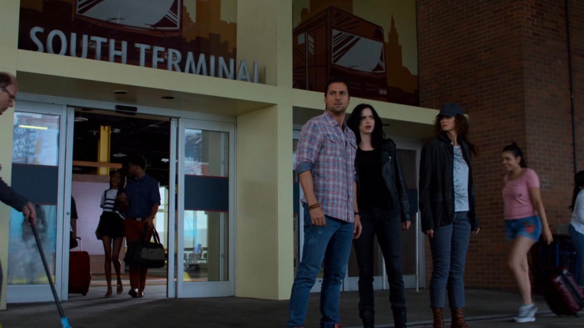 Oscar, Jessica, and Alisa outside South Terminal Bus Depot.