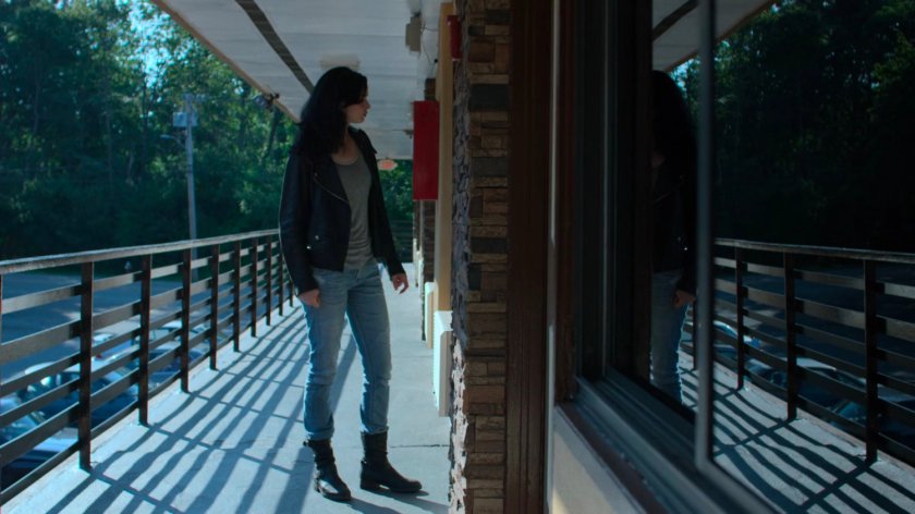 Jessica outside a room at the Love by the Sea Motel.