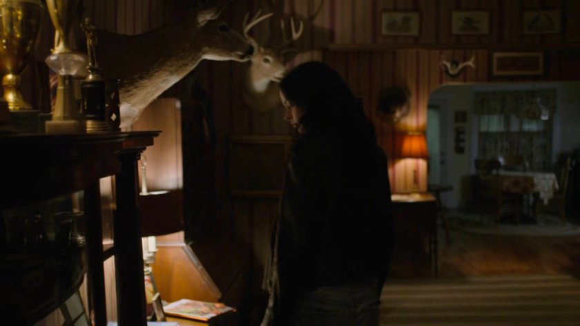 Jessica inside Holiday's house.