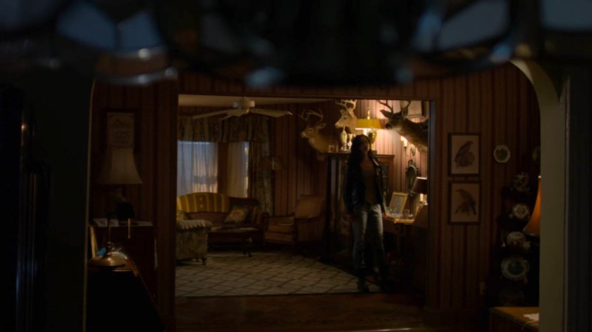 Jessica inside Holiday's house.