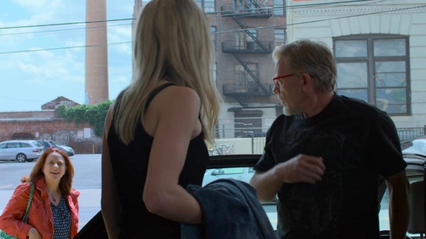 A fan recognizes Trish (with Karl) at a storage facility.