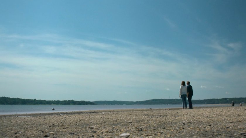 Karl and Alisa on a beach.