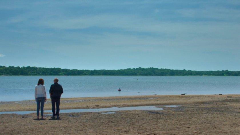 Karl and Alisa on a beach.