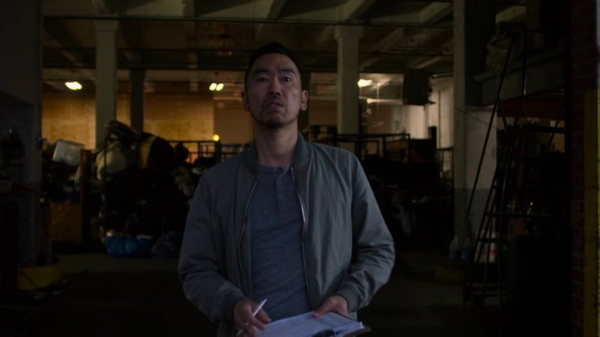 Supervisor standing on a loading dock.