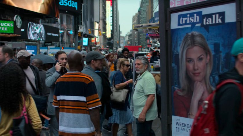 Alisa walking through Times Square.
