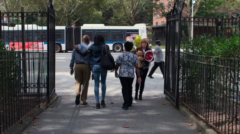 Dorothy walking along sidewalk outside the Riverbank Medical Center.