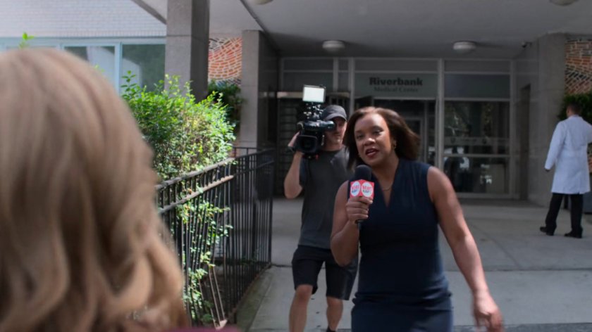 News reporters approaching Dorothy outside the Riverbank Medical Center.