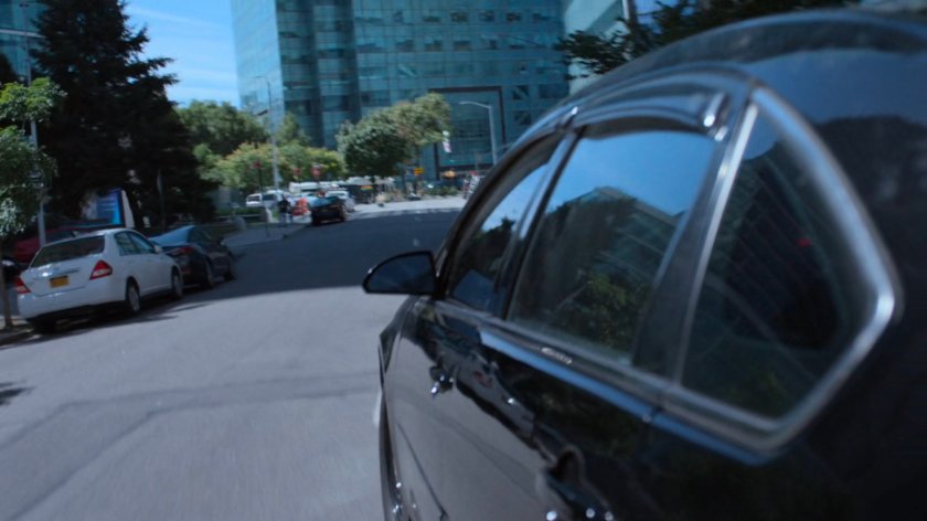 Detective Costa's car speeding through traffic.