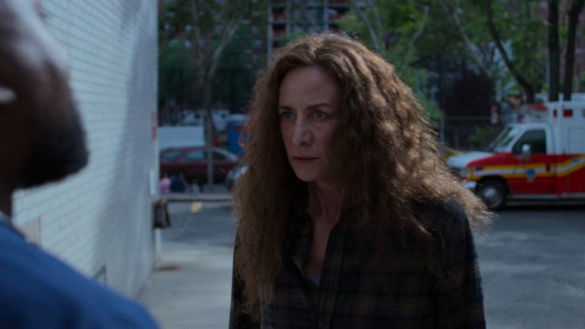 Orderly and Alisa outside the rear side of the Riverbank Medical Center.