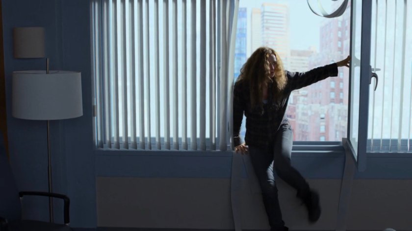 Alisa climbing into Trish's window at the Riverbank Medical Center.