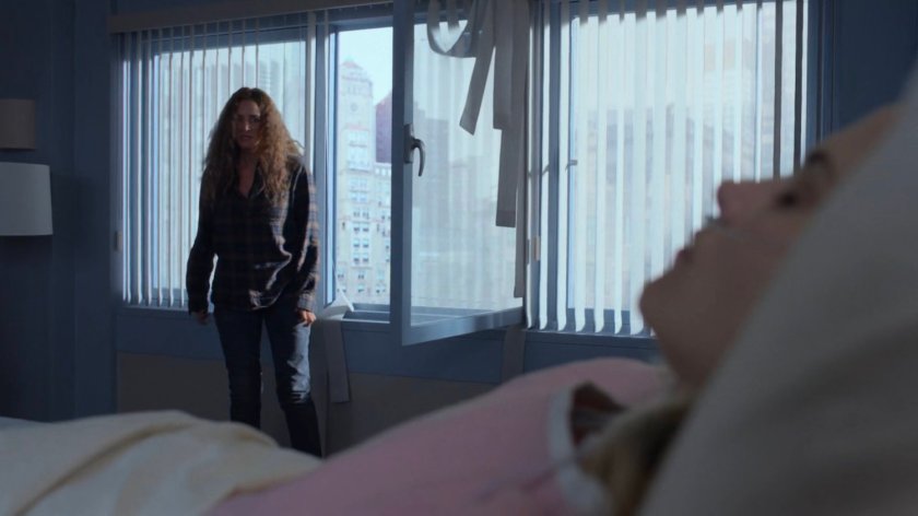 Alisa climbing into Trish's window at the Riverbank Medical Center.