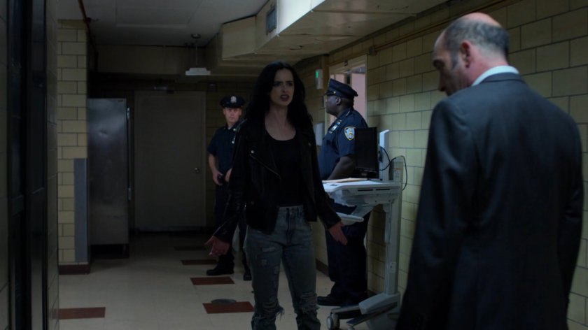 Jessica and Detective Costa in the Riverbank Medical Center morgue.
