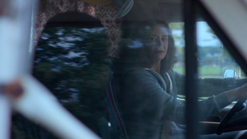 Jessica and Alisa driving along a Westchester road.