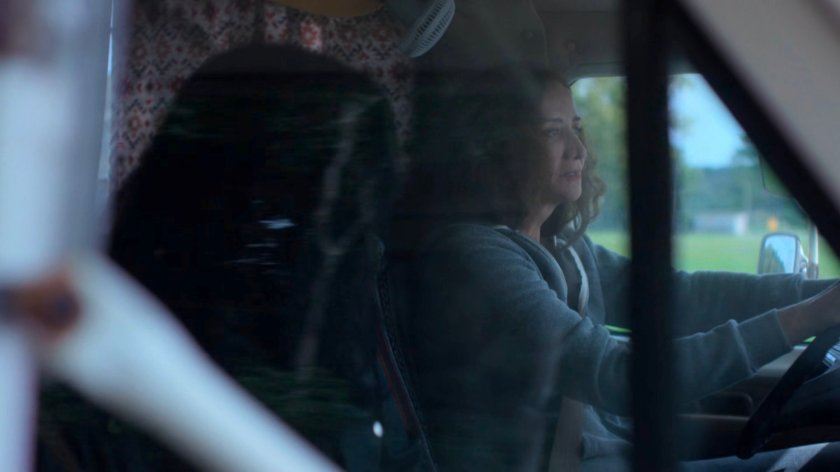 Jessica and Alisa driving along a Westchester road.