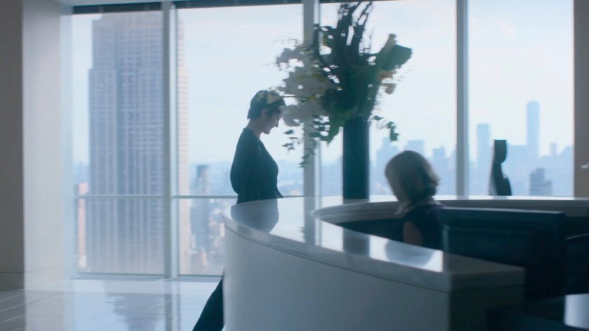 Jeri walking in the lobby of Hogarth, Chao, & Benowitz.