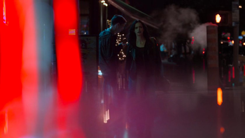 Jessica on a sidewalk outside Sonny's Grocery.