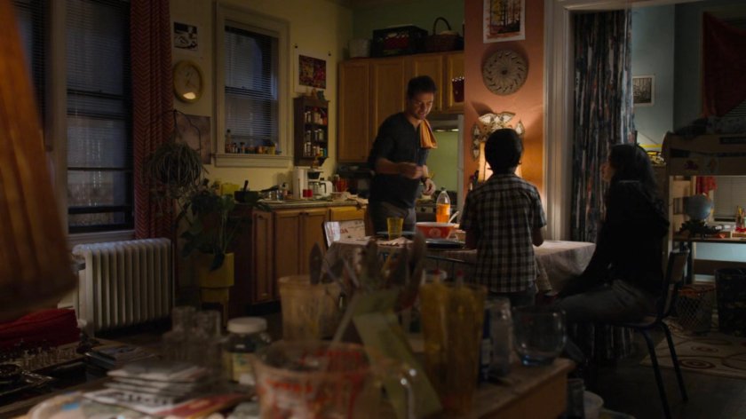 Oscar, Vido, and Jessica in Oscar's apartment.