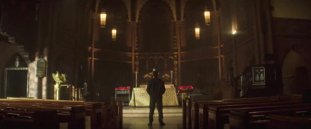 Bullseye standing in Clinton Church.