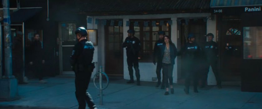 AVTF Agents arrest Ariana outside the Aegean Gardens restaurant.