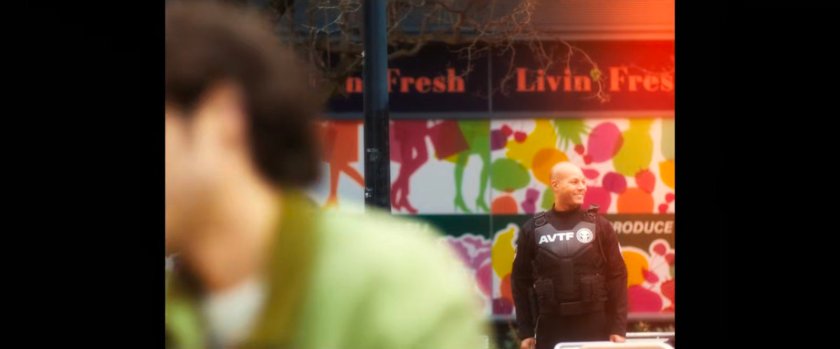 AVTF Officer outside a grocery store window.
