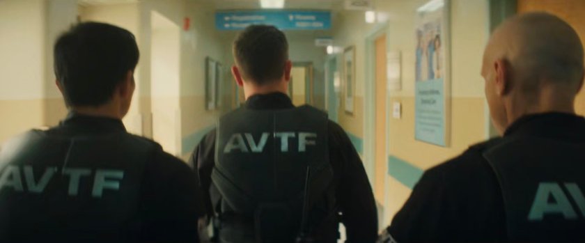 AVTF Officers walking along corridor at Metro-General.