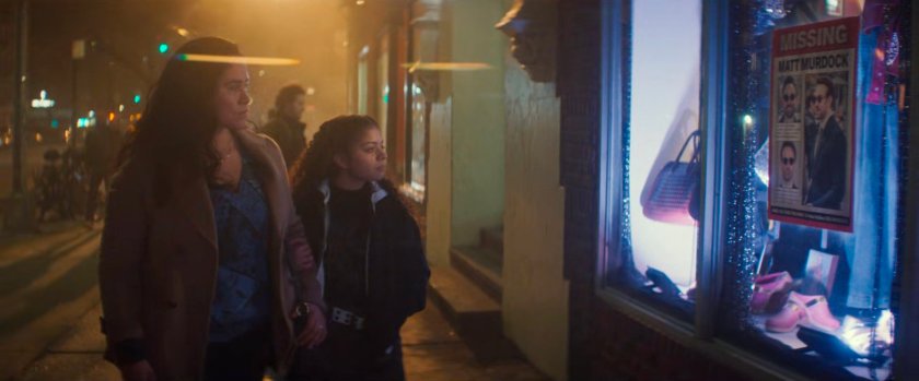 Soledad and Angela on a sidewalk by Berto's Bodega.
