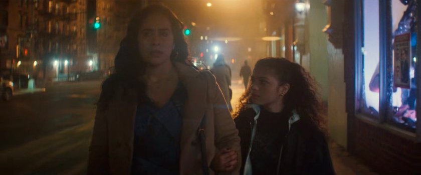 Soledad and Angela on a sidewalk by Berto's Bodega.