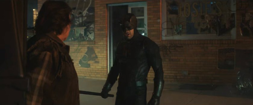 Daredevil and Josie in front of her bar.