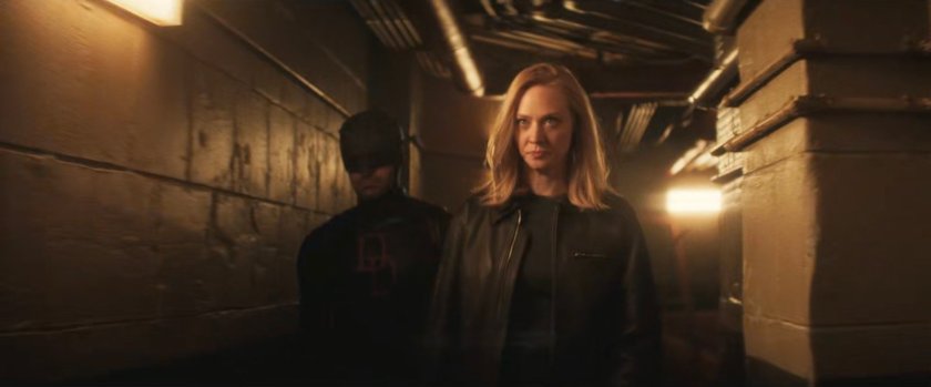 Daredevil and Karen walking through basement of Frank's old hideout.