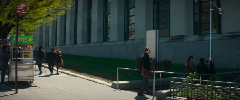 Heather approaching the entrance to the courthouse.