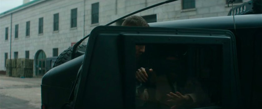Cole and Kirsten exiting truck outside Red Hook detention center.