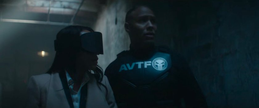 Cole leads Kirsten through the Red Hook detention center.