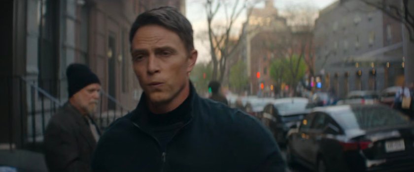 Dex whistling while walking along the sidewalk.