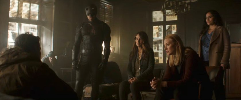 Daredevil, Ariana, Karen, and Soledad listen to Christofi tell his story in resistance hideout.