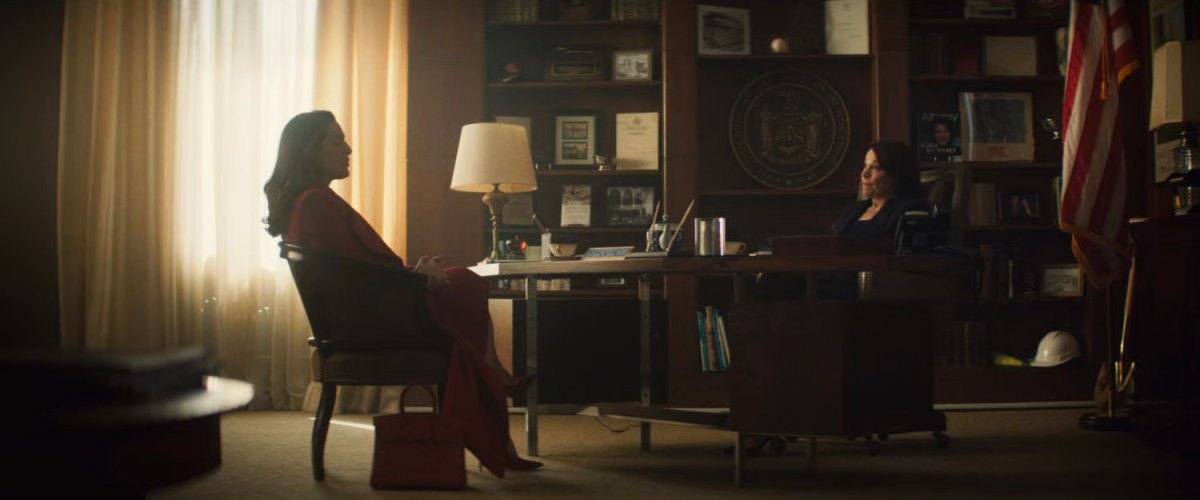 Vanessa speaking with Governor McCaffrey in her office.