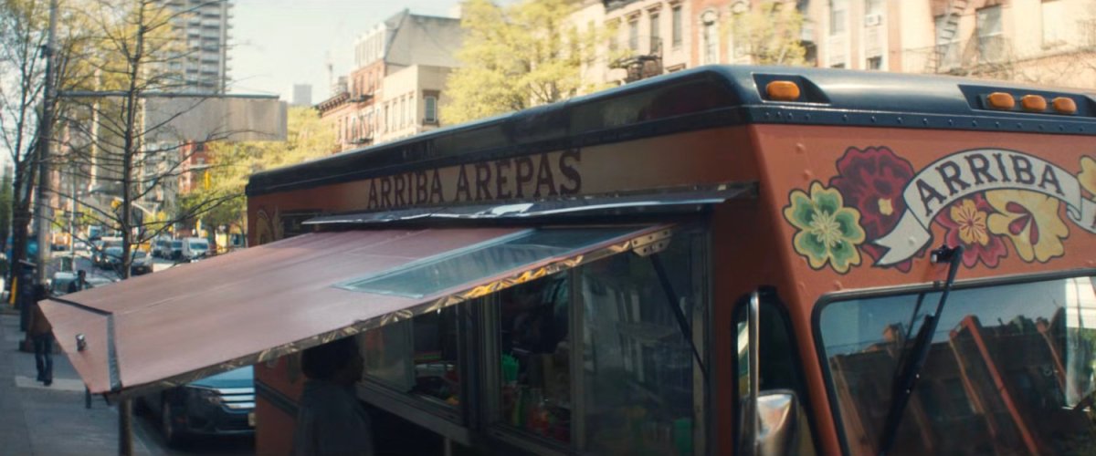 The Arriba Arepas truck parked along a New York street.