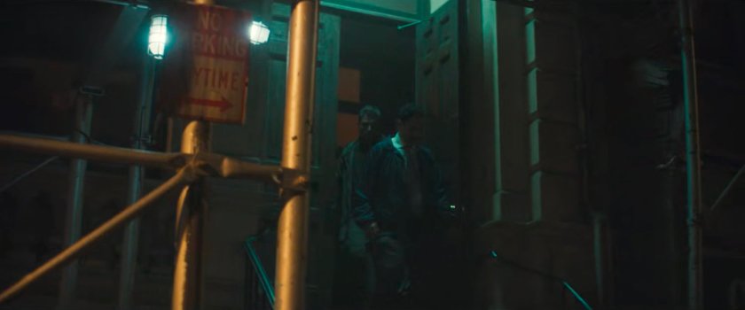 Christofi being escorted from the resistance hideout by two US Marshals.