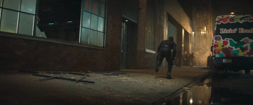 Daredevil on sidewalk outside Fogwell's Gym.