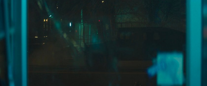 An AVTF SUV driving past a park.