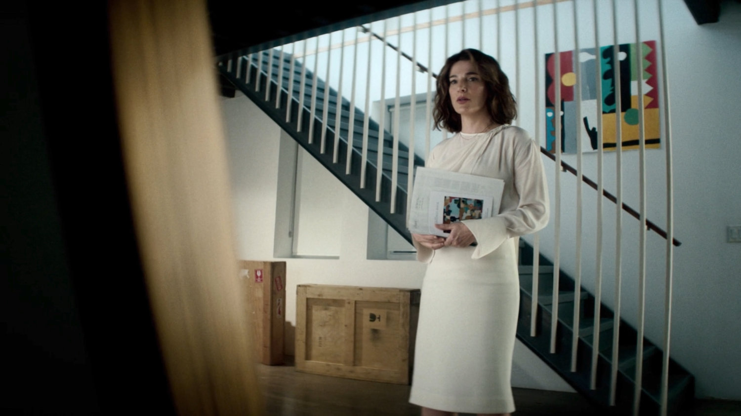 Flashback of Vanessa in her gallery.