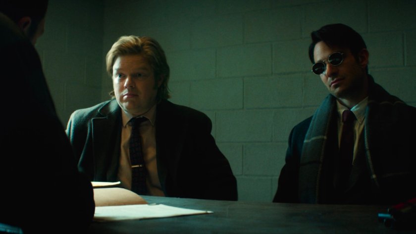 Flashback of Foggy and Matt in an interrogation room in the 15th Precinct.