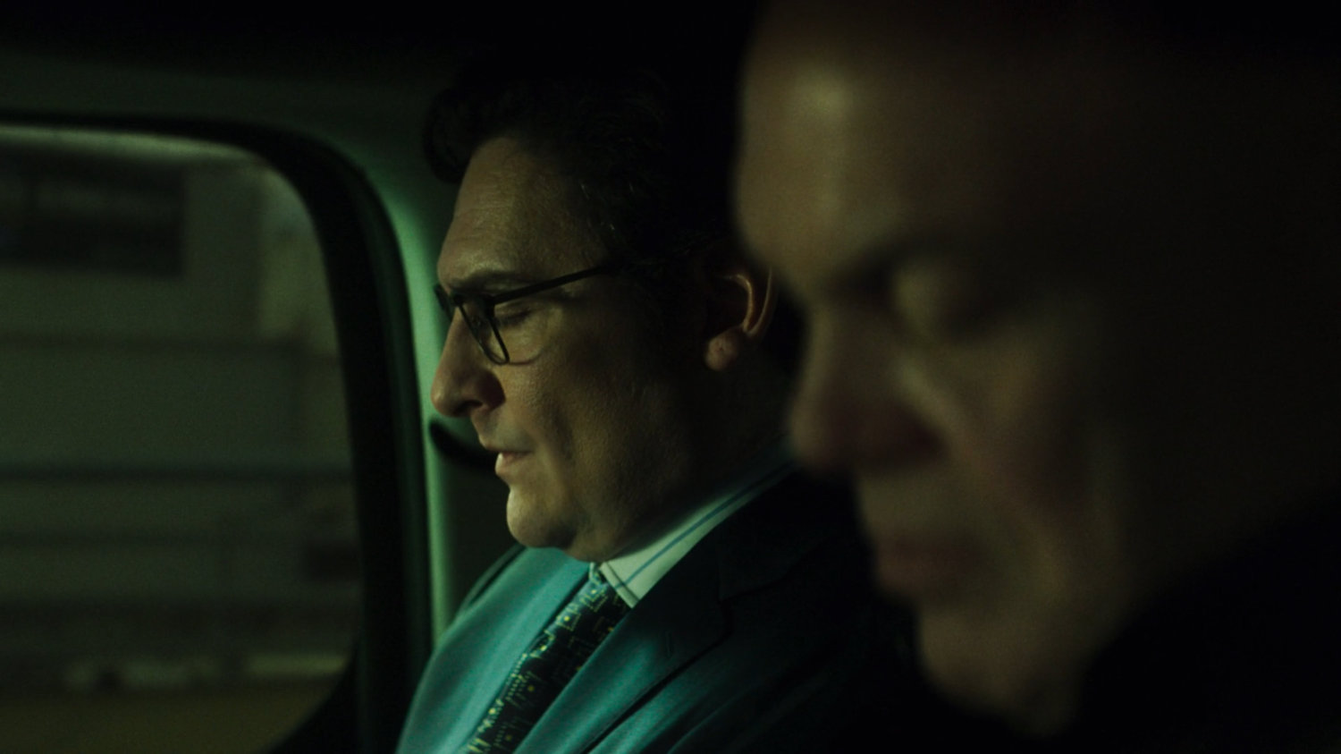 Flashback of Wesley and Fisk in the backseat of an SUV.